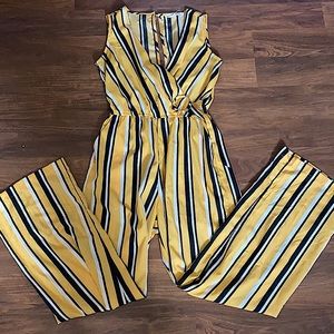 black & yellow romper. Size S. Never worn